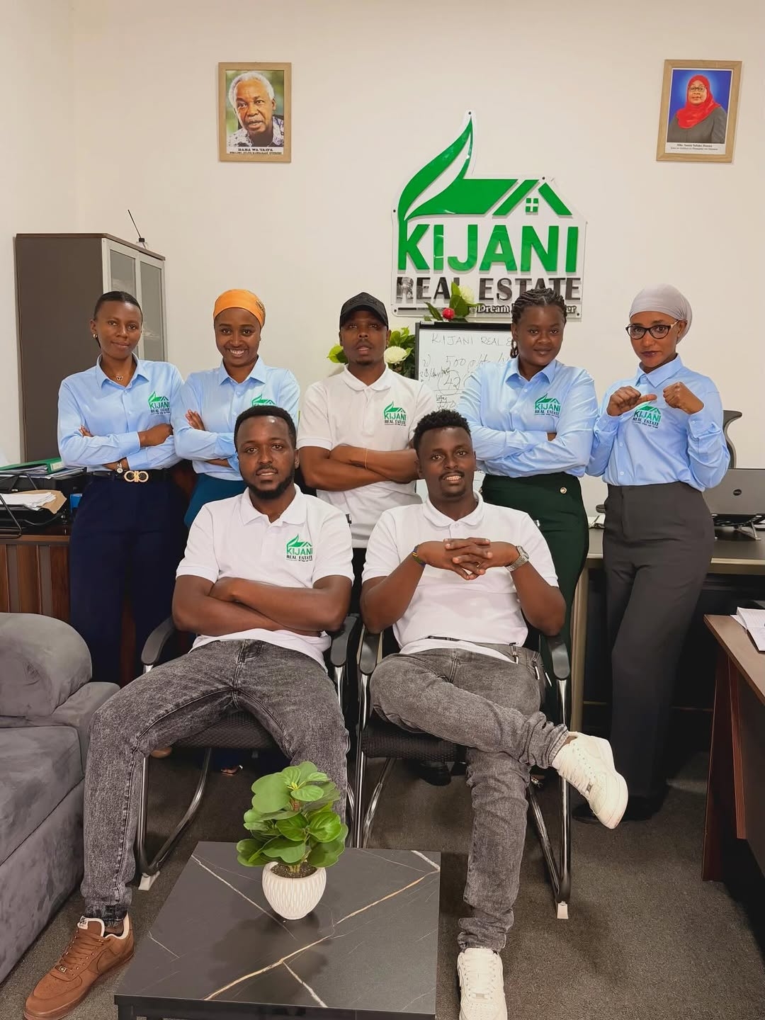 Kijani Real Estate Team with clients at a land plot viewing